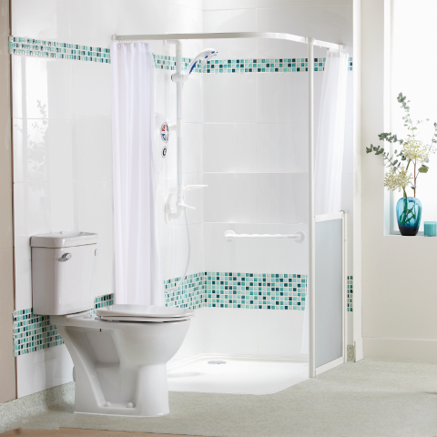 Shower designed with seniors in mind, featuring grab bars and anti-slip flooring.