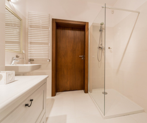 A wet room conversion with safety features and stylish bathroom fittings.